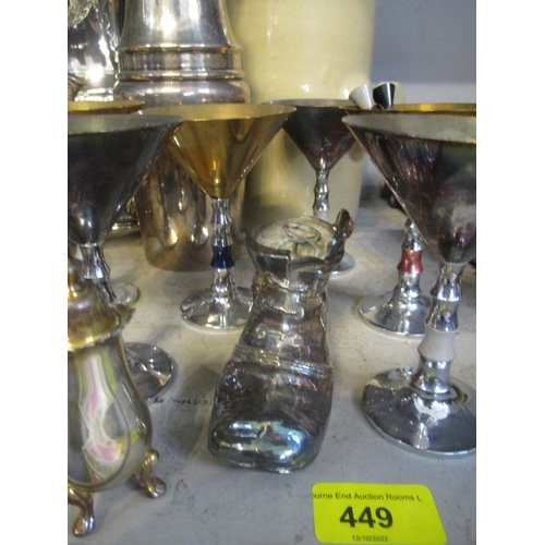 449 - A mixed lot of silver plate and other items to include a seven bottle cruet stand and bottles (one b... 