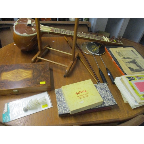 452 - A mixed lot to include an Indian sitar A/F, cased Backgammon game in folding box, and other games, a... 