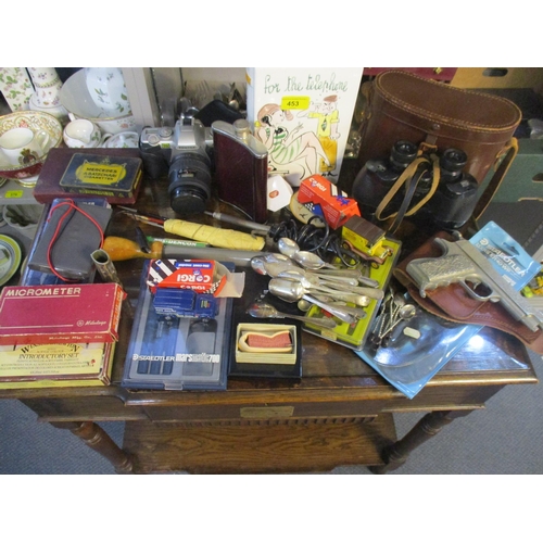 453 - A mixed lot to include a leather cased Ross of London binoculars, a Pentax M2-5 film camera, tools, ... 