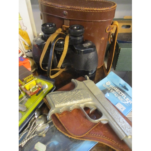 453 - A mixed lot to include a leather cased Ross of London binoculars, a Pentax M2-5 film camera, tools, ... 