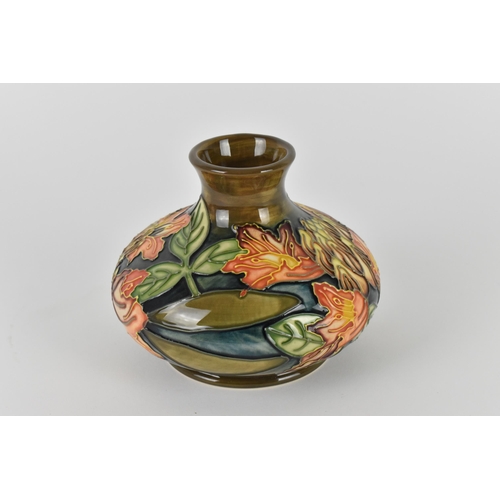 10 - A late 20th century Moorcroft pottery squat vase designed by Philip Gibson, 1997, in the 'Flame of t... 