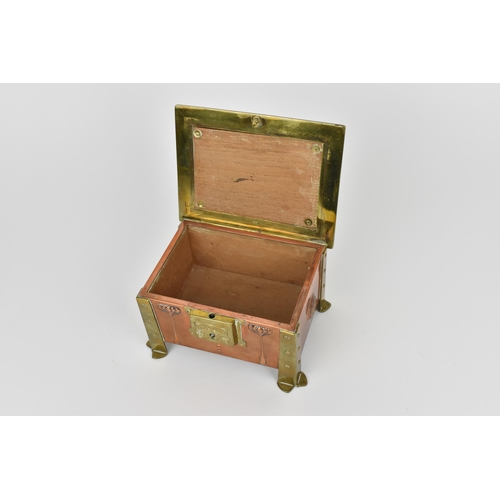 24 - An Arts & Crafts copper, brass and enamel box, with four brass rivet brackets to each corner against... 