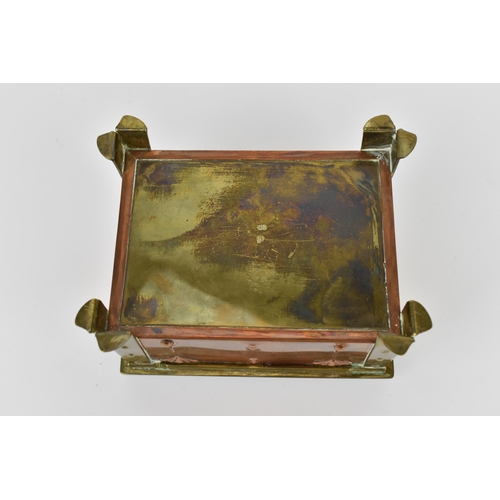 24 - An Arts & Crafts copper, brass and enamel box, with four brass rivet brackets to each corner against... 