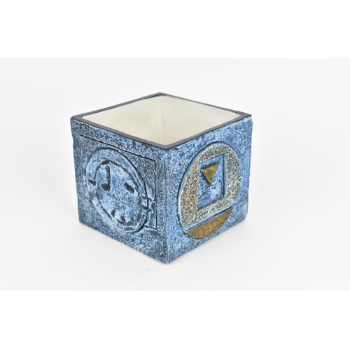 27 - A Troika pottery cube vase by Simone Kilburn, circa 1970s, in blue with textured ground and geometri... 