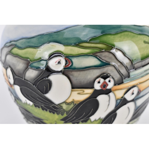 3 - A Moorcroft pottery 'Puffin' pattern vase designed by Carol Lovett, 1997, with impressed marks and s... 