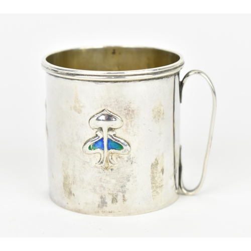 30 - An Edwardian silver and enamel christening cup by Daniel George Collins, Birmingham 1907, with embos... 