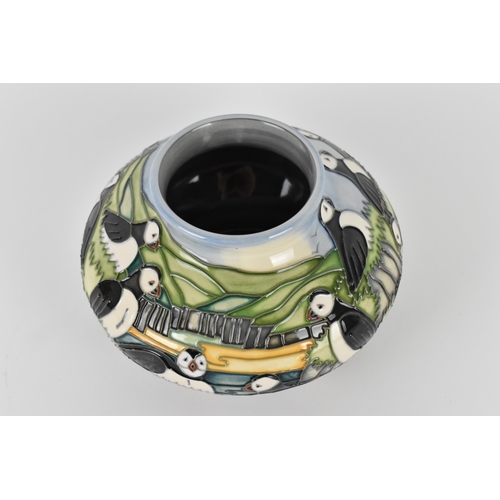 8 - A Moorcroft pottery 'Puffin' pattern squat vase designed by Carol Lovett, 1997, with impressed marks... 