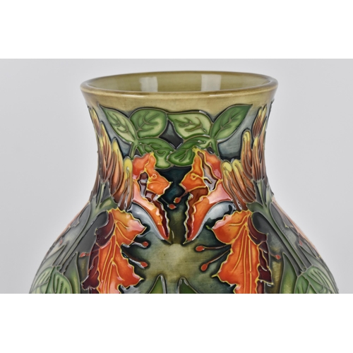 9 - A late 20th century Moorcroft pottery vase designed by Philip Gibson, in the 'Flame of the Forest' p... 