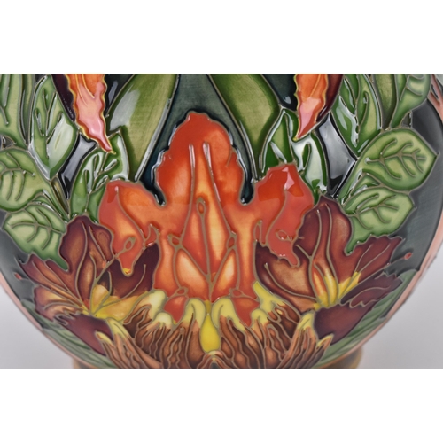 9 - A late 20th century Moorcroft pottery vase designed by Philip Gibson, in the 'Flame of the Forest' p... 