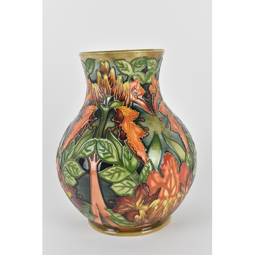 9 - A late 20th century Moorcroft pottery vase designed by Philip Gibson, in the 'Flame of the Forest' p... 