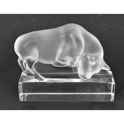 103 - This Lot Has Been Withdrawn

A Lalique frosted glass paperweight model of a bull, on a rectangular t... 