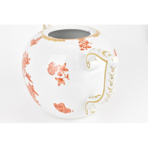 104 - A large Herend porcelain teapot, in the Chinese 'Apponyi' bouquet in orange, with woven effect to th... 