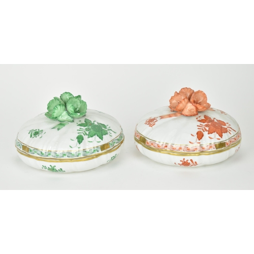 105 - Two Herend porcelain lidded boxes in the 'Apponyi' pattern, green and orange, each with Chinese bouq... 