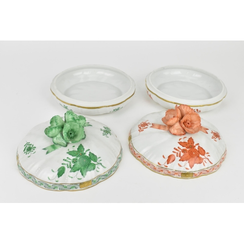 105 - Two Herend porcelain lidded boxes in the 'Apponyi' pattern, green and orange, each with Chinese bouq... 