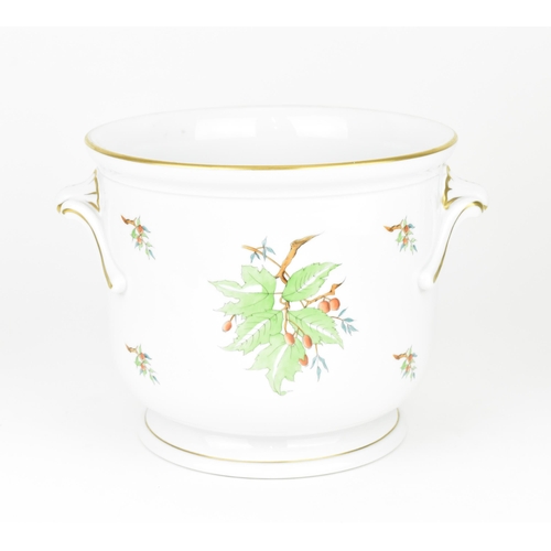 106 - A large Herend porcelain cachepot, in the 'Rosehip' pattern, with shell handles either side and gilt... 