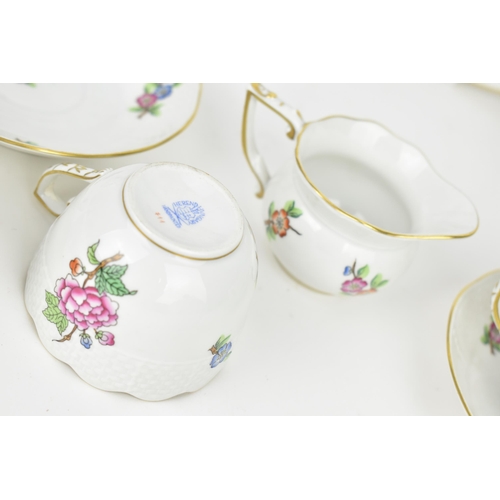 109 - A Herend porcelain floral pattern part cabaret tête-à-tête service, in the 'Eton' pattern, to includ... 