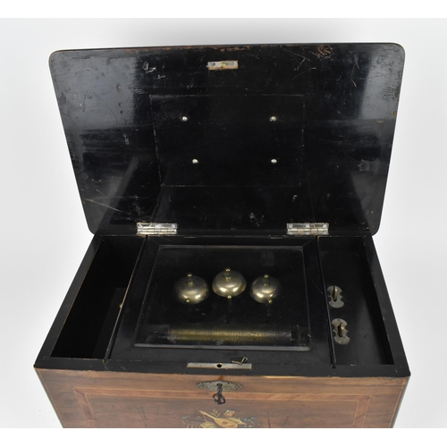 170 - A late 19th century inlaid cylinder music box, with three bells and brass cylinder with graduated co... 