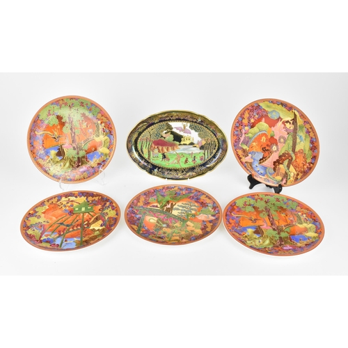 79 - A Wedgwood Fairyland Lustre dish, design by Daisy Makeig Jones, depicting leap-frogging elves and pi... 