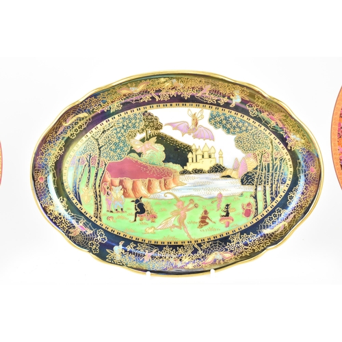 79 - A Wedgwood Fairyland Lustre dish, design by Daisy Makeig Jones, depicting leap-frogging elves and pi... 