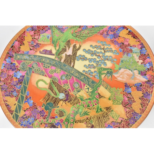 79 - A Wedgwood Fairyland Lustre dish, design by Daisy Makeig Jones, depicting leap-frogging elves and pi... 