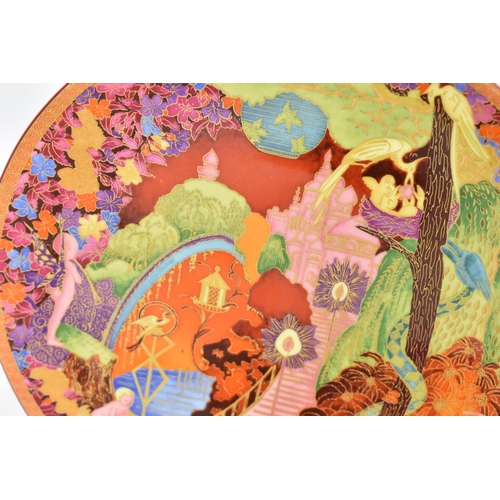 79 - A Wedgwood Fairyland Lustre dish, design by Daisy Makeig Jones, depicting leap-frogging elves and pi... 