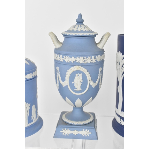 83 - A small collection of Wedgwood jasperware, to include a blue and white lidded urn with classical cam... 