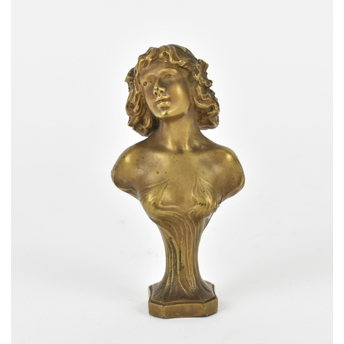 118 - A small cast bronze female bust designed by Joe Descomps, (French,1872-1948), modelled in the art no... 