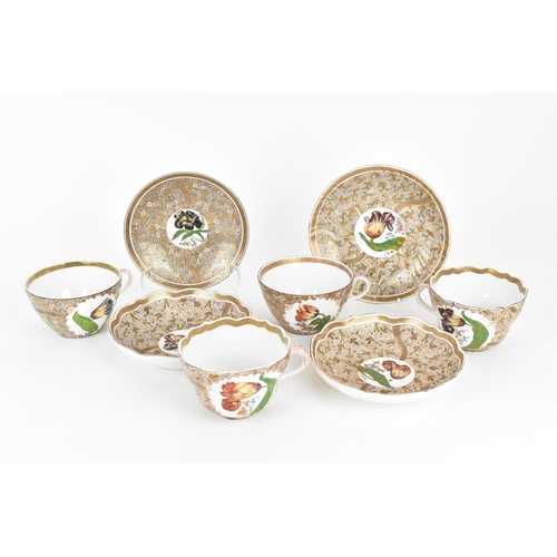 123 - A late 19th century Hungarian porcelain part tea set by Fischer Vilmos, Kolozsvá, comprising two set... 