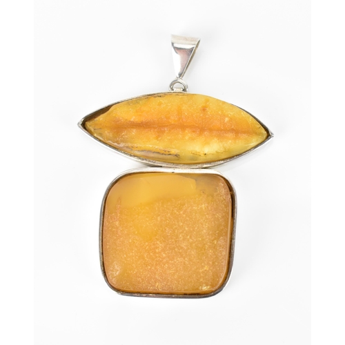 153 - An Ivone Brosch silver pendant set with amber, fashioned as a conjoined lozenge and a square, signed... 