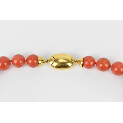 180 - An Italian 18ct yellow gold and red coral single strand bead necklace and pair of matching earrings,... 