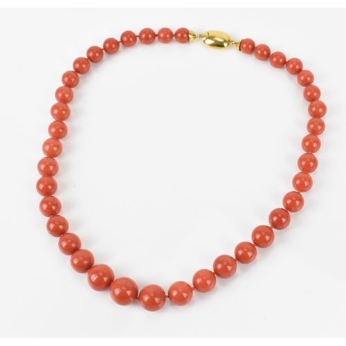 180 - An Italian 18ct yellow gold and red coral single strand bead necklace and pair of matching earrings,... 