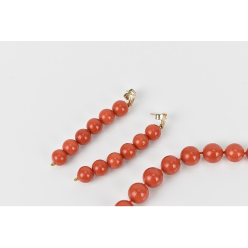 180 - An Italian 18ct yellow gold and red coral single strand bead necklace and pair of matching earrings,... 