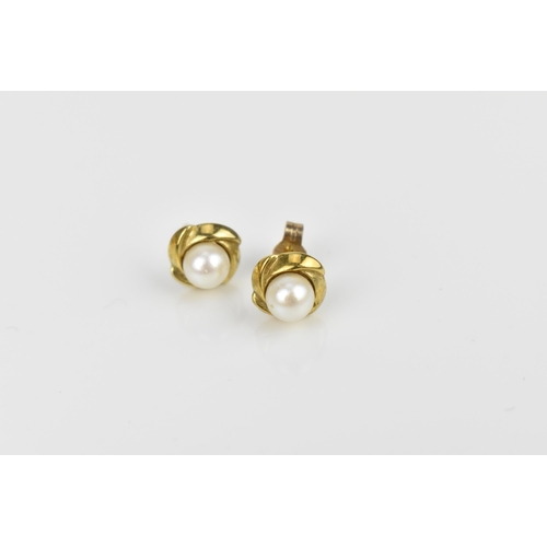 185 - A pair of 18ct yellow gold, pearl, diamond and blue sapphire earrings, with teardrop sapphire above ... 