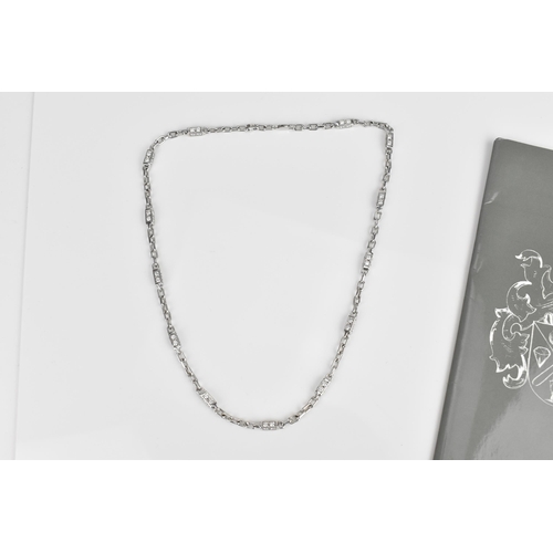 188 - An 18ct white gold and diamond necklace, with cable chain and cube links set with eight brilliant cu... 