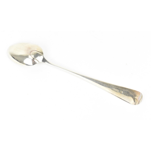 201 - A George V silver basting spoon by Harrods Ltd of London, 1930, in the Old English pattern, 30.5 cm ... 