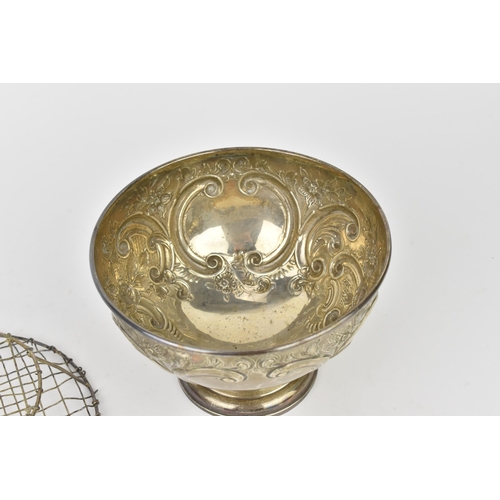 206 - A late Victorian silver rose bowl by Walter & John Barnard, London 1892, with central empty cartouch... 