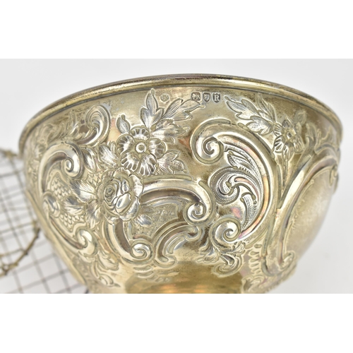 206 - A late Victorian silver rose bowl by Walter & John Barnard, London 1892, with central empty cartouch... 