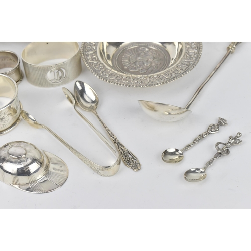 212 - A mixed lot of silver to include a George V silver sugar caster by Viner's Ltd, with matching toast ... 