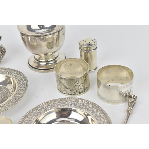 212 - A mixed lot of silver to include a George V silver sugar caster by Viner's Ltd, with matching toast ... 