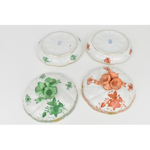 105 - Two Herend porcelain lidded boxes in the 'Apponyi' pattern, green and orange, each with Chinese bouq... 