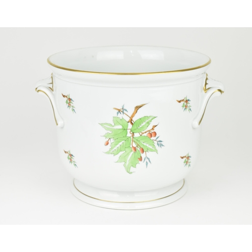 106 - A large Herend porcelain cachepot, in the 'Rosehip' pattern, with shell handles either side and gilt... 