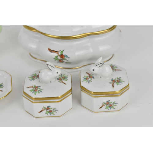 107 - A small collection of Herend porcelain in the 'Rosehip' pattern, to include a pair of pill boxes wit... 