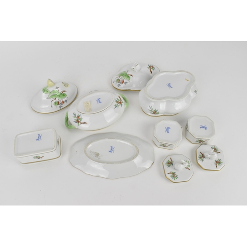 107 - A small collection of Herend porcelain in the 'Rosehip' pattern, to include a pair of pill boxes wit... 