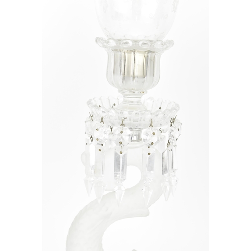 131 - A 20th century Baccarat moulded glass hurricane lamp in the 'dauphin' design, with etched glass shad... 