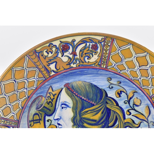 151 - An Italian renaissance style maiolica tin-glaze lustre charger, in the manner of Deruta, with centra... 