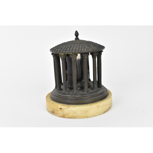 217 - A 19th century Grand Tour patinated bronze inkwell in the shape of a classical rotunda, possibly the... 