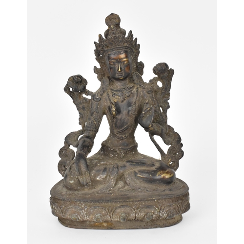 218 - A 19th century Sino-Tibetan cast bronze model of green Tara Buddha, 19.5 cm high