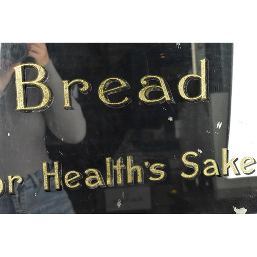 229 - A large Hovis advertising mirror, reading 'EAT HOVIS BREAD FOR HEALTH'S SAKE', the mirror plate in a... 