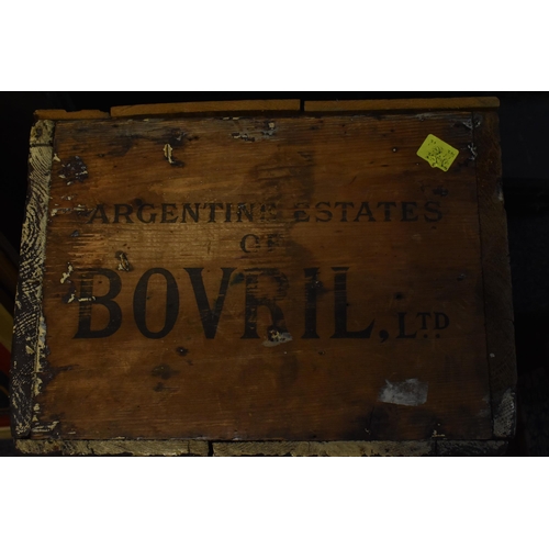 236 - A vintage advertising BOVRIL wooden crate, with hinged lid, the front and back in red lettering read... 