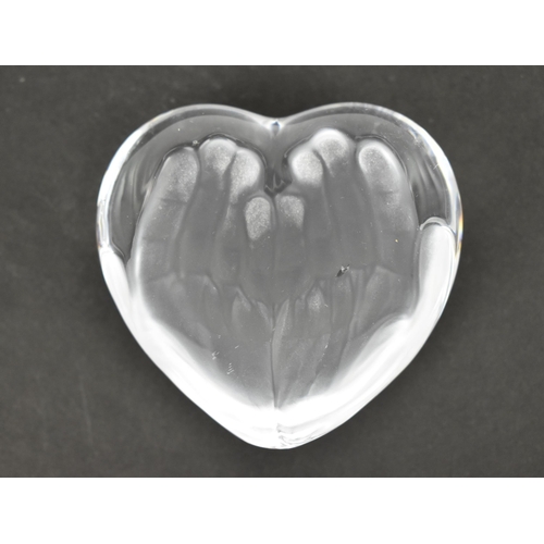 49 - A Daum glass paperweight designed by Tony Morgan, in the shape of a heart with frosted hand print to... 